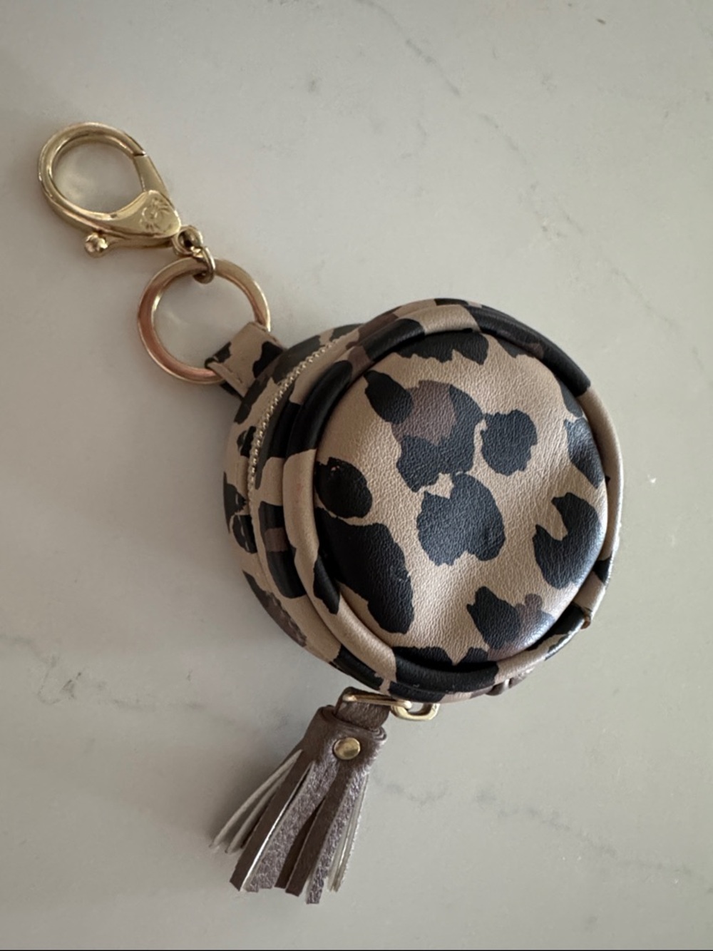 Itzy Ritzy Leopard Print Round paci Keychain Pouch with Tassel - Beige/Black